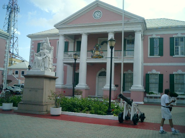 A big pink goevernment building in the Bahamasx. Click to display the image.