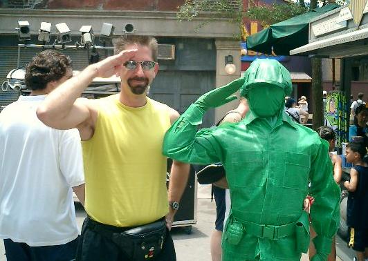 Rex poses with a green army man.