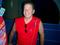 Steve enjoys his wait in line at the Haunted Mansion on Saturday. Click to display the image.