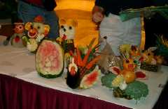 Vegetable carving - we were just passing through on our way to the initial meeting of the Scavenger Hunt. Click to display the image.