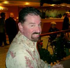 Steve at the center atrium - people-watching. Click to display the image.