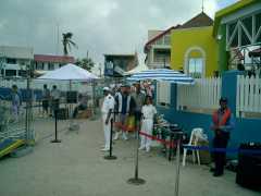 The couple from Austin waiting in line for the tender at Grand Caymen. Click to display the image.