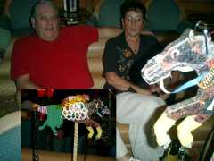 Our tablemates bought one of the horses for the many, many, instances of horse race gambling. Sadly, they didn't win. Click to display the image.